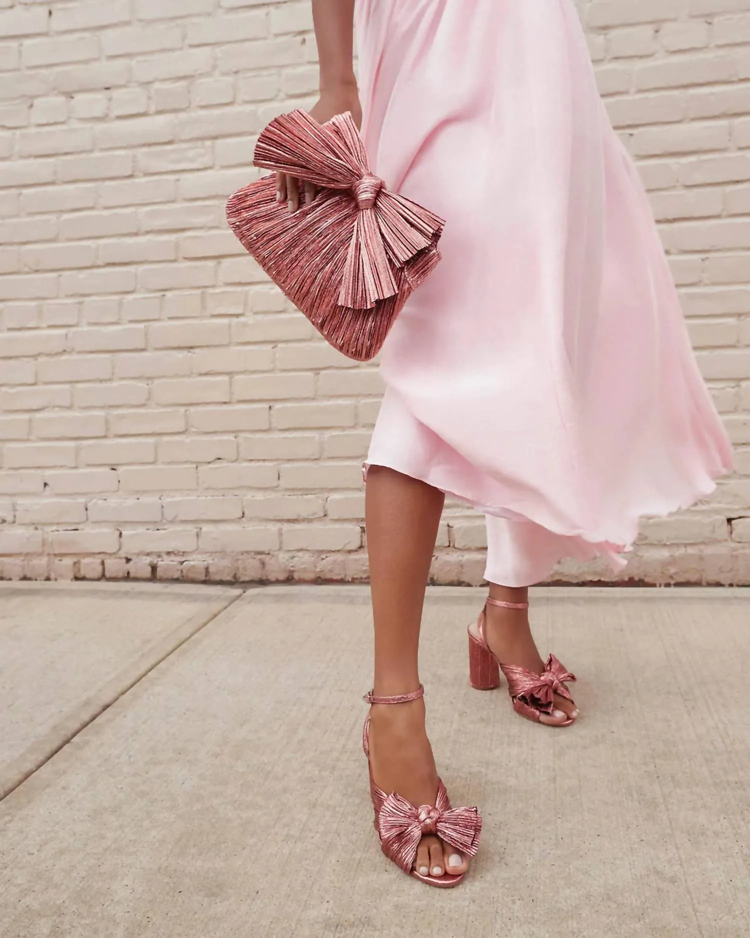 Women's Camellia Pleated Bow Heel Sandal In Metallic Rose